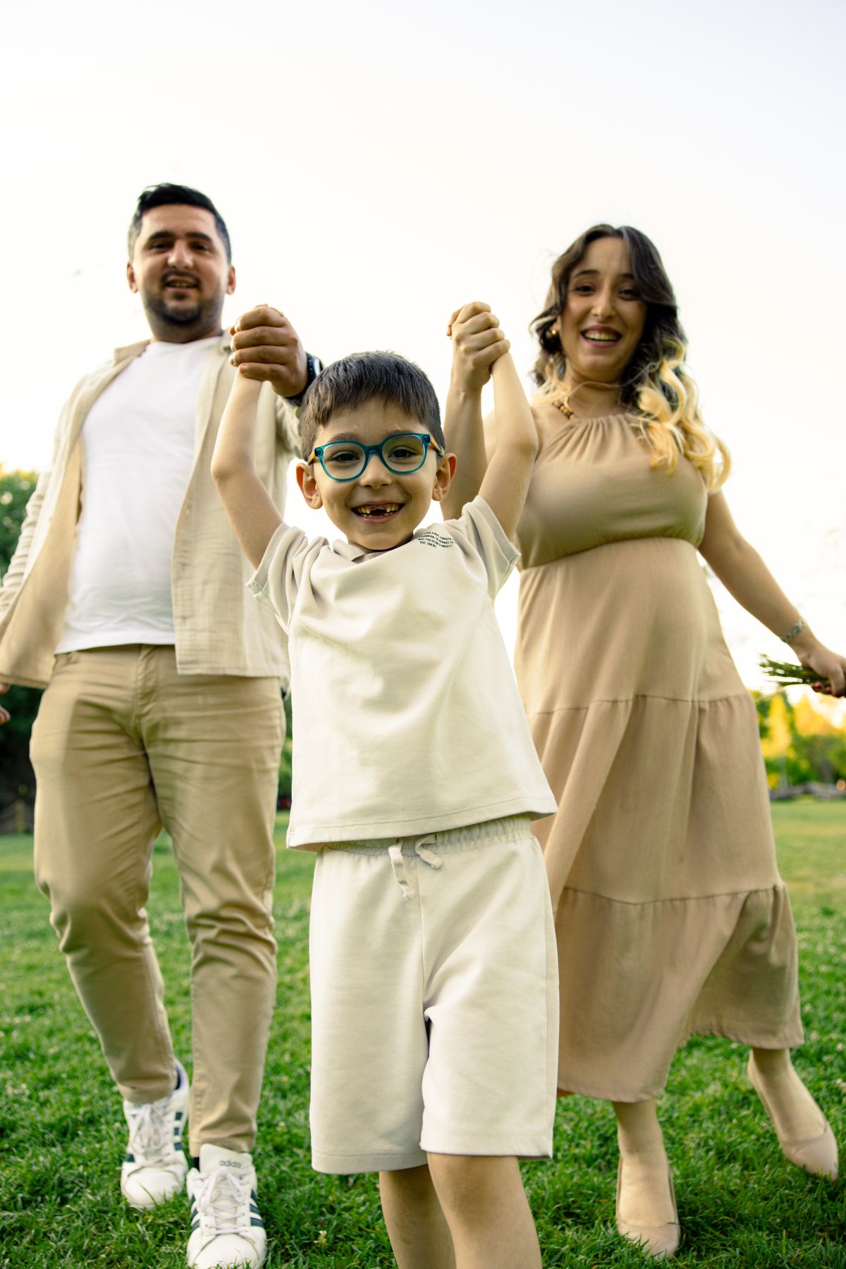 Happy Family Enjoying Outdoor Day in Park